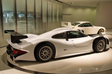 Stuttgart, Germany - July 5 2022: Historic collection of Porsche racing, sport and classic cars. Interior of Porsche automobile museum. Permanent exhibition of 911 targa, 961, Carrera coupe and others