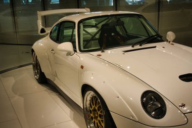 Stuttgart, Germany - July 5 2022: Historic collection of Porsche racing, sport and classic cars. Interior of Porsche automobile museum. Permanent exhibition of 911 targa, 961, Carrera coupe and others