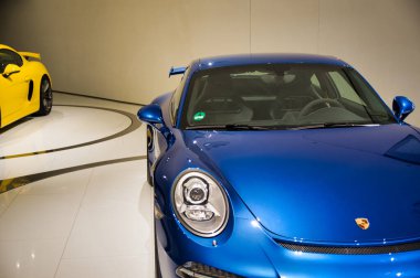 Stuttgart, Germany - July 5 2022: Historic collection of Porsche racing, sport and classic cars. Interior of Porsche automobile museum. Permanent exhibition of 911 targa, 961, Carrera coupe and others