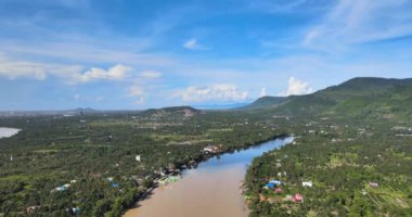 aerial drone shot of a large river on sunny day
