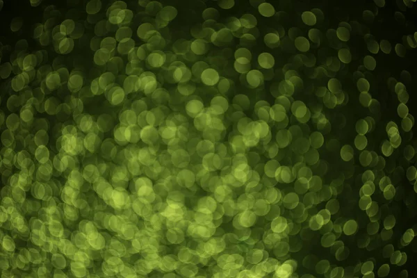 Green glitter defocused photography, Different shades of green bokeh balls, holiday backdrop
