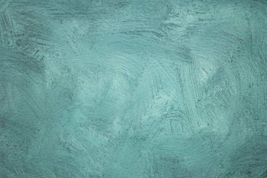 green and white paint on leather texture, with vignette, soft focus macro