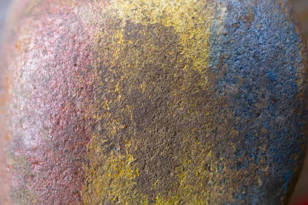 Red , yellow and blue colors on a stone texture, Romanian flag colors