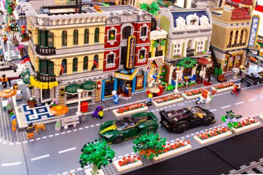 Urban scene with busy street and vintage buildings made from lego blocks at a mall exibition