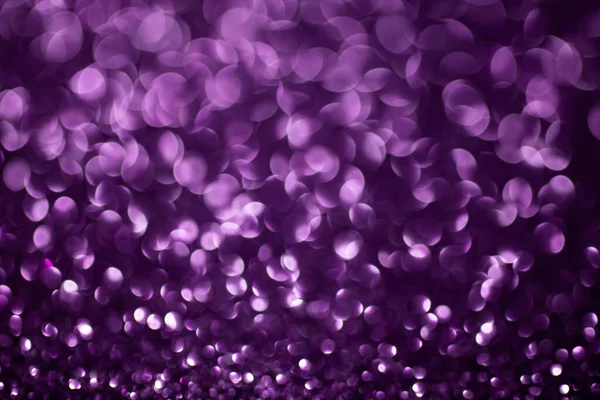 Violet glitter defocused, bokeh balls backdrop for product presentation, close up