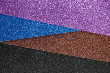 Menekşe, mavi, kahverengi ve siyah simli çarşaflar, yumuşak odak dokusu