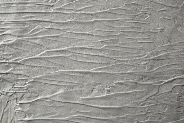 流体灰色のレリーフの背景 波状の石膏セメントの背景 ブラシストロークで抽象的な背景 — ストック写真