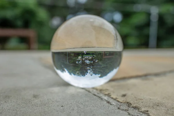 stock image Lens ball on sand stone , soft focus close up