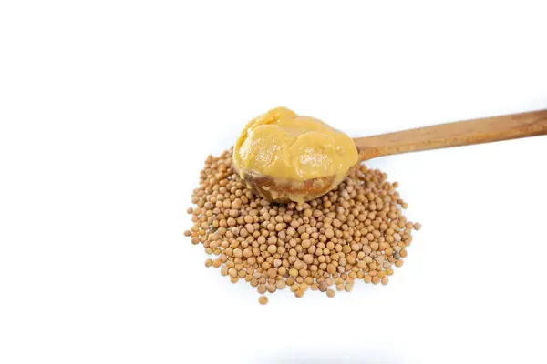 Mustard Seeds Paste Wooden Spoon Isolated White Background Soft Focus Stock Image
