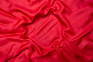 Red natural silk with ripples and waves, copy space for product   clipart