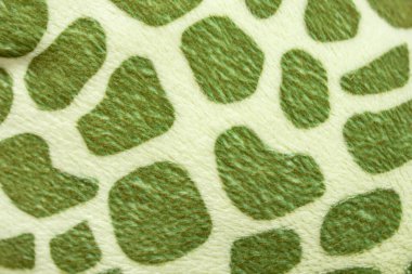 Sentetik kumaş üzerinde yeşil hayvan derisi deseni, yumuşak keçeli oyuncak imalatı, soyut  