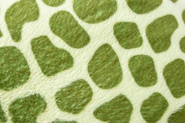 Green animal skin pattern on synthetic fiber fabric, soft felt toy manufacturing, abstract  clipart