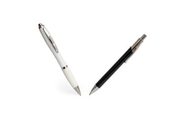 Two roller ball pens standing and  levitating on white background, close up   clipart