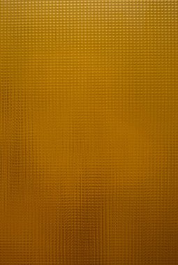 Kare şeklindeki desenli altın rengi kıvrımlı cam deseni, parlak arkaplan  