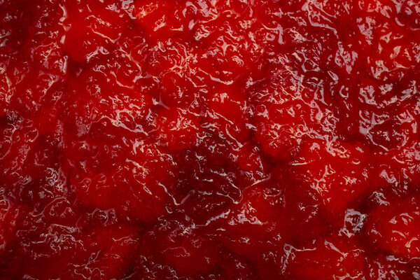 Gelatin layer over strawberry slices structure, abstract culinary  texture