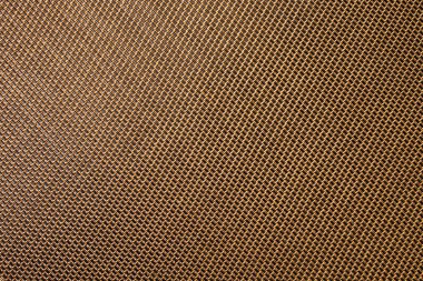 Metalik altın rengi örülmüş yapı, soyut, pürüzsüz arkaplan.