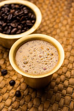 South Indian Filter coffee served in a traditional brass or stainless steel cup