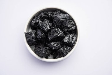 Shilajit is an ayurvedic medicine found primarily in the rocks of the Himalayas. selective focus