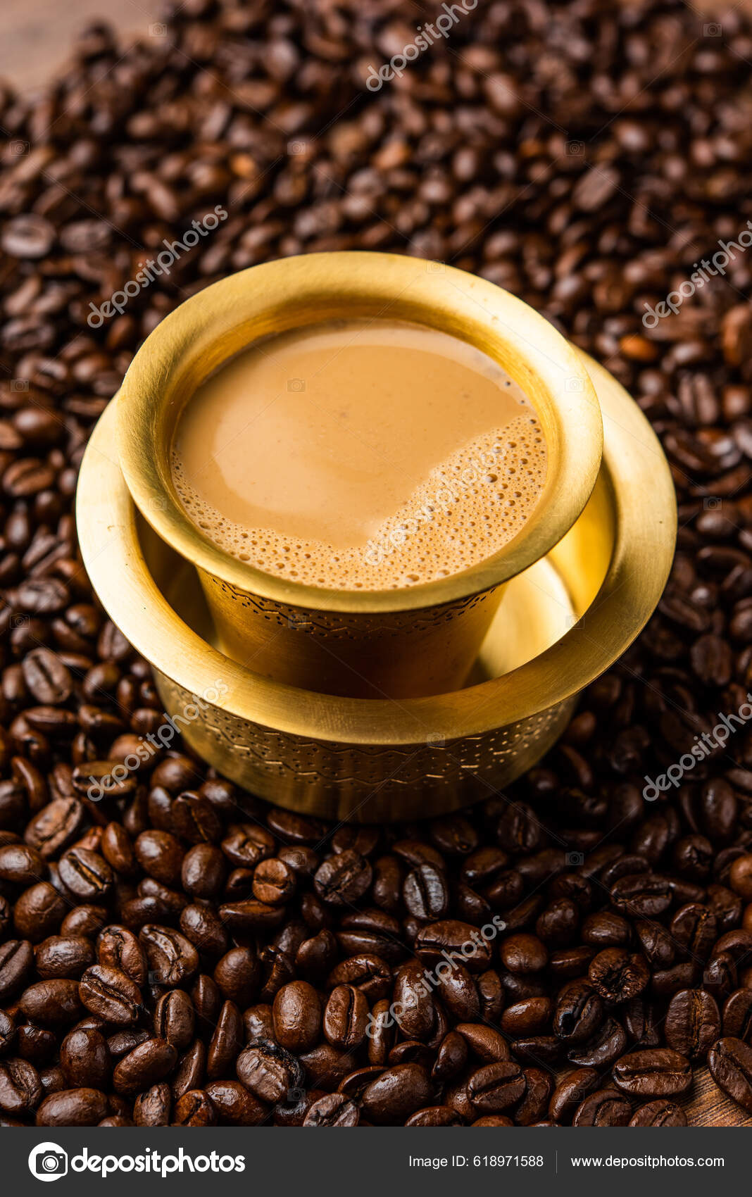 South Indian Filter Coffee Served Traditional Brass Stainless Steel Cup  Stock Photo by ©stockimagefactory.com 618971588