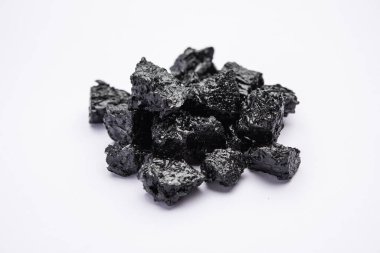 Shilajit is an ayurvedic medicine found primarily in the rocks of the Himalayas. selective focus