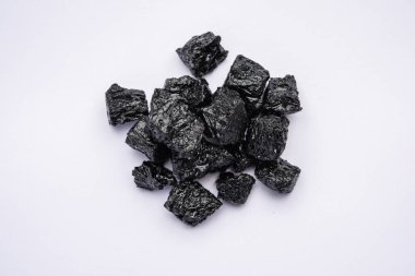Shilajit is an ayurvedic medicine found primarily in the rocks of the Himalayas. selective focus clipart
