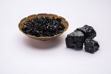 Shilajit is an ayurvedic medicine found primarily in the rocks of the Himalayas. selective focus
