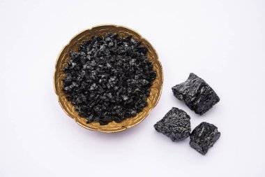 Shilajit is an ayurvedic medicine found primarily in the rocks of the Himalayas. selective focus