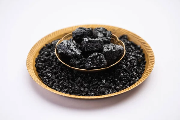 Shilajit is an ayurvedic medicine found primarily in the rocks of the Himalayas. selective focus