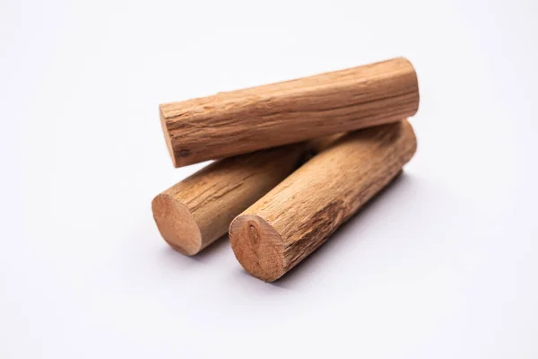 stock image Chandan or sandalwood powder with sticks, perfume or oil which retain their fragrance for decades