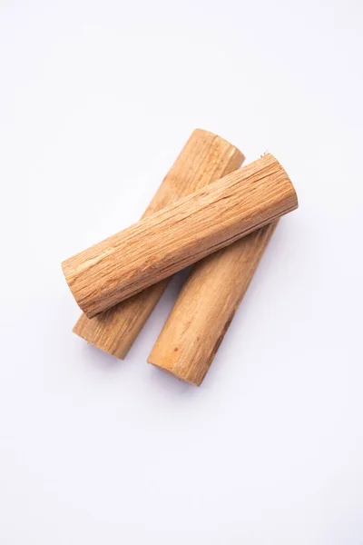 stock image Chandan or sandalwood powder with sticks, perfume or oil which retain their fragrance for decades