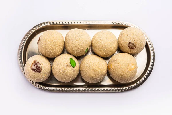 stock image Rava Laddu or sooji ladoo is an Indian Sweet made with semolina, sugar, ghee, cashews and raisins