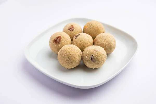 stock image Rava Laddu or sooji ladoo is an Indian Sweet made with semolina, sugar, ghee, cashews and raisins