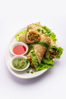 Indian chapati veg spring Rolls filled with vegetables and spices, also called franky clipart
