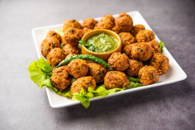 Moong Dal Vada Mungode, Pakot, Pakore, Moong wada, Pakora veya Bhajiya, çay saati atıştırmalığı.