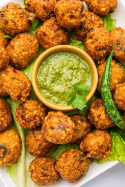 Moong Dal Vada Mungode, Pakot, Pakore, Moong wada, Pakora veya Bhajiya, çay saati atıştırmalığı.