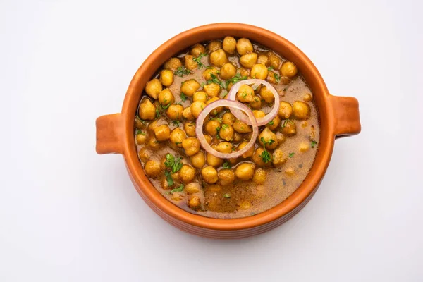 Punjabi Chana Masala or Chole Masala, is an authentic North Indian style curry made with chickpeas