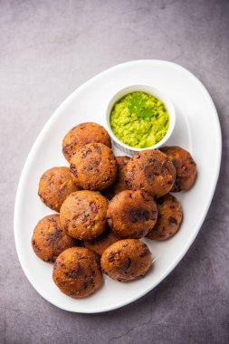 Millet Vada ya da pirzola, Urad dal ve Mills 'in birleşiminden oluşan bir Vada çeşididir.