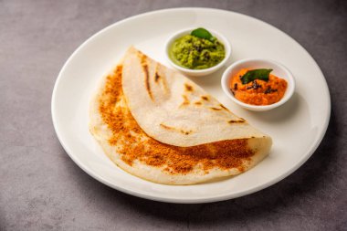 Podi Dosa ya da dosai, Hint baharatlı ve lezzetli bir tariftir ve idli milagai podi veya barut içerir.