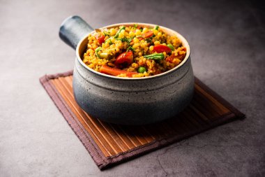 Bisi bele bath or bhath or huliyanna is a spicy, rice based dish from Karnataka, India
