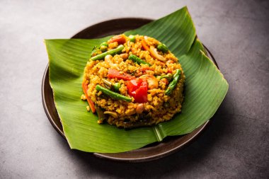 Bisi bele bath or bhath or huliyanna is a spicy, rice based dish from Karnataka, India