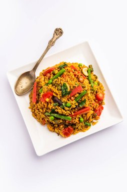 Bisi bele bath or bhath or huliyanna is a spicy, rice based dish from Karnataka, India