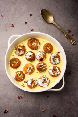 Rasbali is a traditional Indian sweet made from chhena or cottage cheese and dipped in sugar syrup