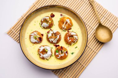 Rasbali is a traditional Indian sweet made from chhena or cottage cheese and dipped in sugar syrup