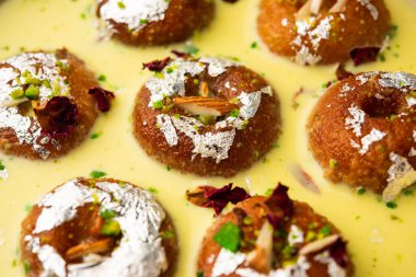 Rasbali is a traditional Indian sweet made from chhena or cottage cheese and dipped in sugar syrup