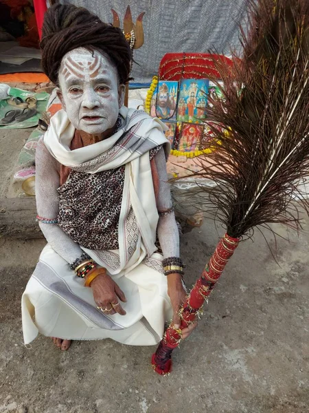Calcutta, West Bengal,India 8th January 2023:Sadhavi or women sadhu smeared with vibhuty or holy ash waiting for devotees to bless at Gangasagar transit camp or akhara .