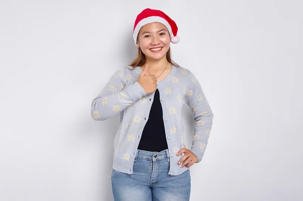 Portrait Smiling Young Asian Woman Santa Claus Hat Showing Thumbs Stock Image