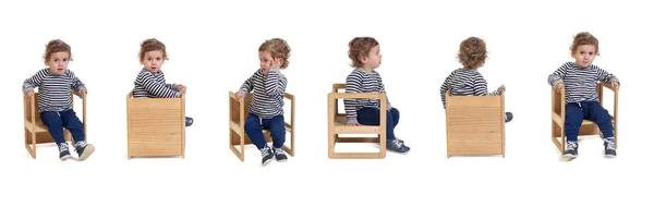Beyaz Arka Planda Sandalyede Oturan Bir Çocuğun Çeşitli Pozları — Stok fotoğraf