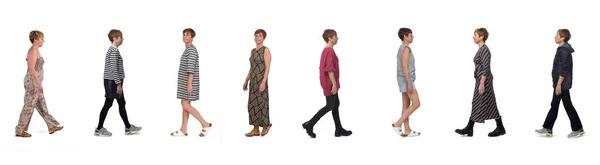 Vista Lateral Misma Mujer Diferentes Trajes Caminando Sobre Fondo Blanco — Foto de Stock