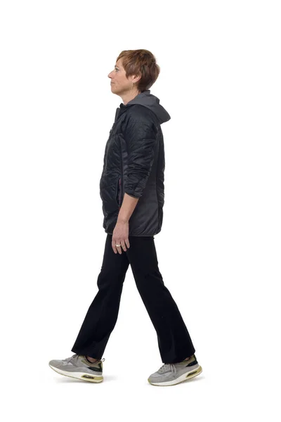 Vista Lateral Uma Mulher Andando Com Sportswear Fundo Branco — Fotografia de Stock