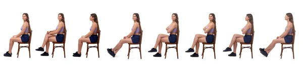 Boční Pohled Skupinu Stejné Mladé Dívky Sedící Židli Bílém Pozadí — Stock fotografie